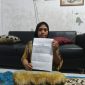 Keluarga Korban menunjukan Hasil Lapoan, Dok (Ist/Totalbanten.com).