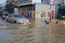 Suasana Banjir Menggenangi Ruas Jalan di Kawasan Perumahan Taman Mangu Indah, kota Tanggerang Selatan, Dok : (Totalbanten.com)