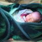 Bayi laki-laki yang ditemukan terbungkus kantong plastik merah di pesisir Pantai Bunda, Kampung Neglasari, Desa Panimbang Jaya, Kecamatan Panimbang, Kabupaten Pandeglang, Dok: (Gun/Total Banten)
