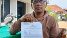 Korban dugaan pengeroyokan di kawasan Pasar Rau, Kota Serang, memperlihatkan dokumen laporan Dok : ( Ist/Total Banten)